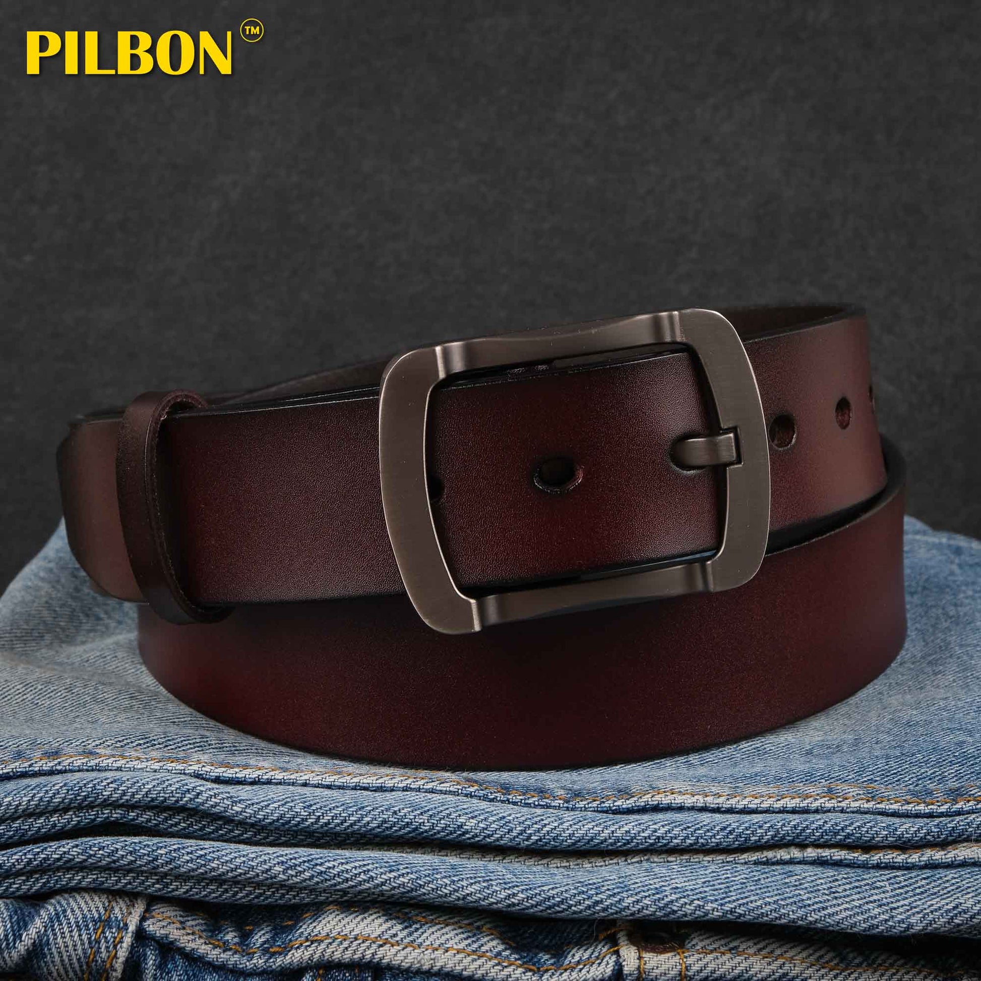 Brown leather PILBON G319 belt with stainless alloy buckle, styled on denim for a fashionable look.